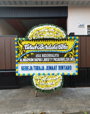 Papan Bunga Duka di Li Anogomma
